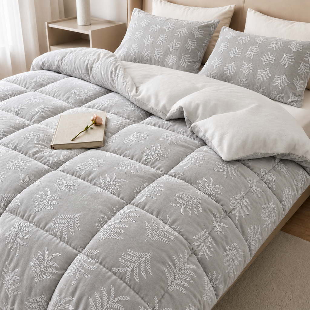 Embroidery effect glued flannel comforter